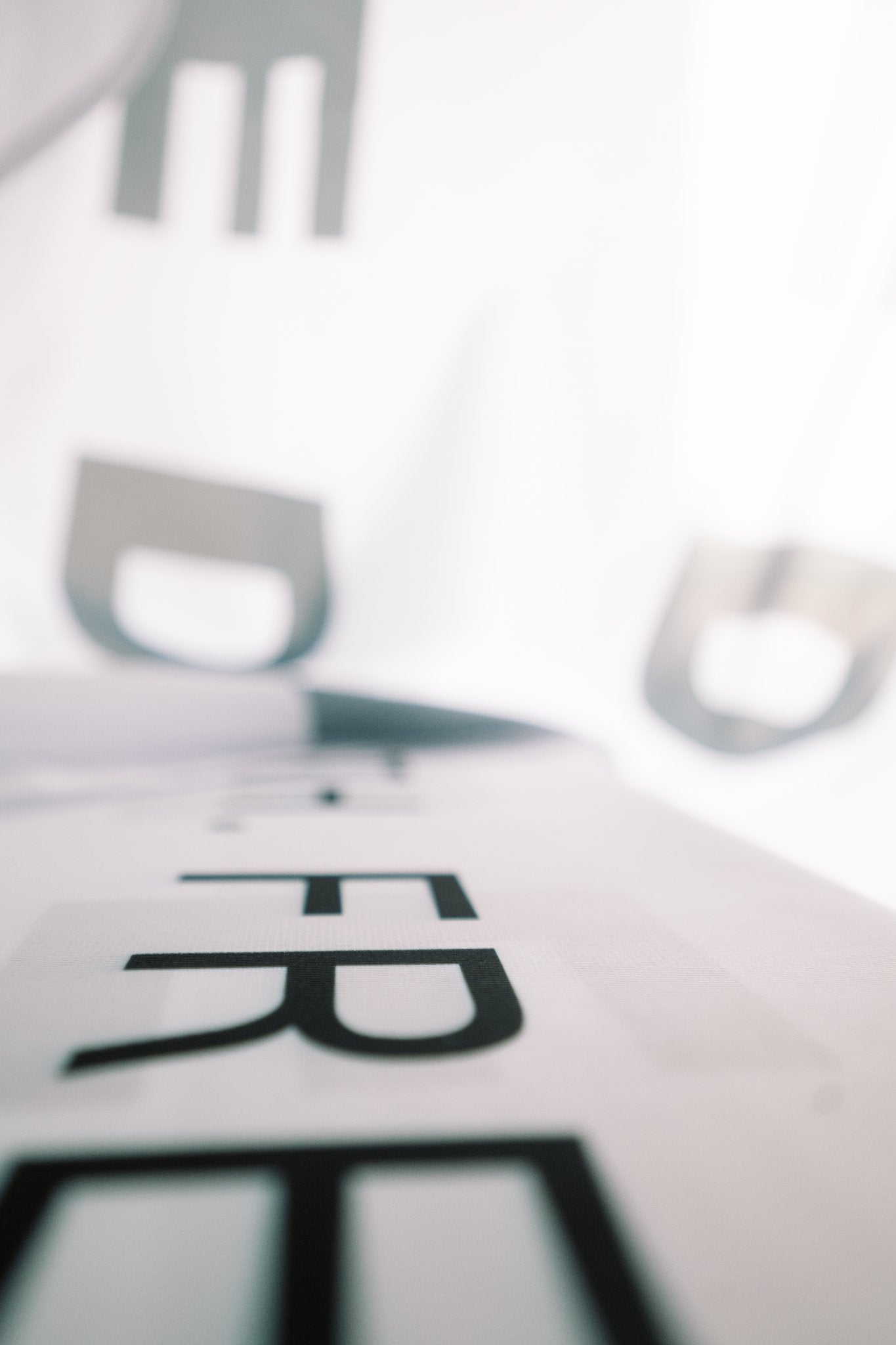 Triple Freedom Flag — Repeating Black Text Design